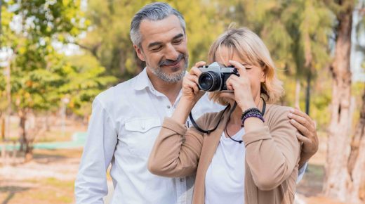 vecteezy_couple-taking-photos-outside_1259681-min